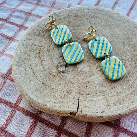 Double teal and gold present