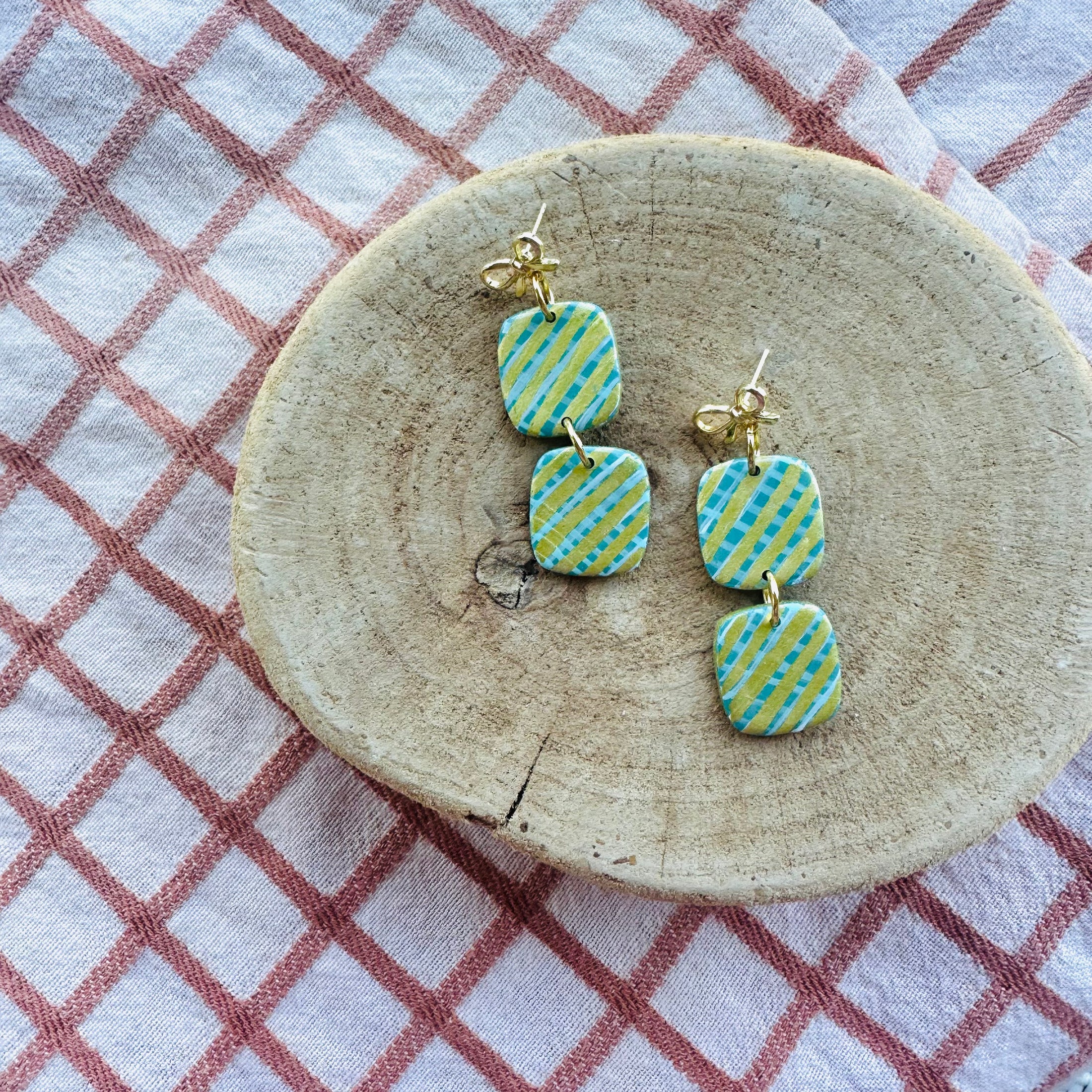 Double teal and gold present