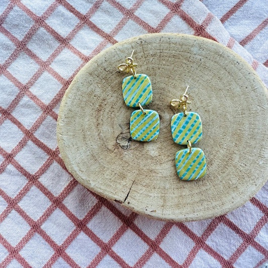 Double teal and gold present