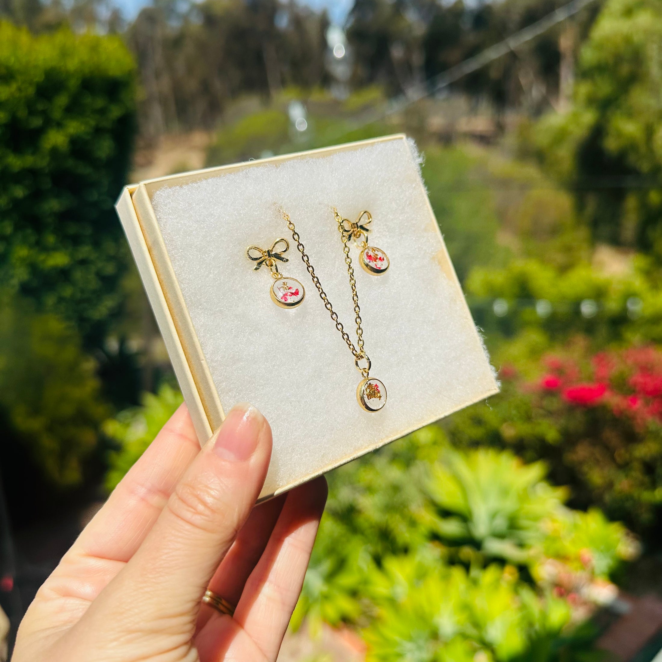 Red flower and gold gift box