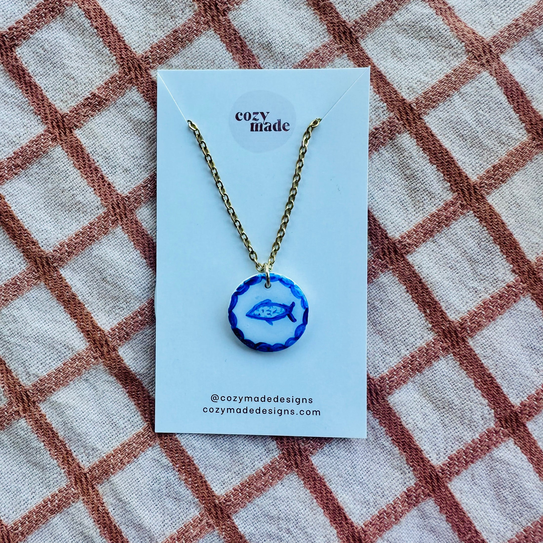 Blue fish necklace