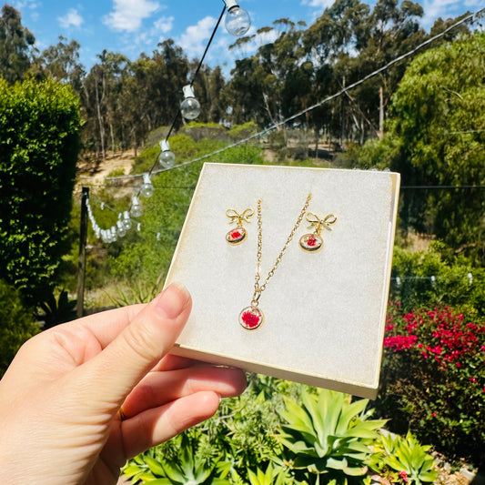 Red flower and gold gift box