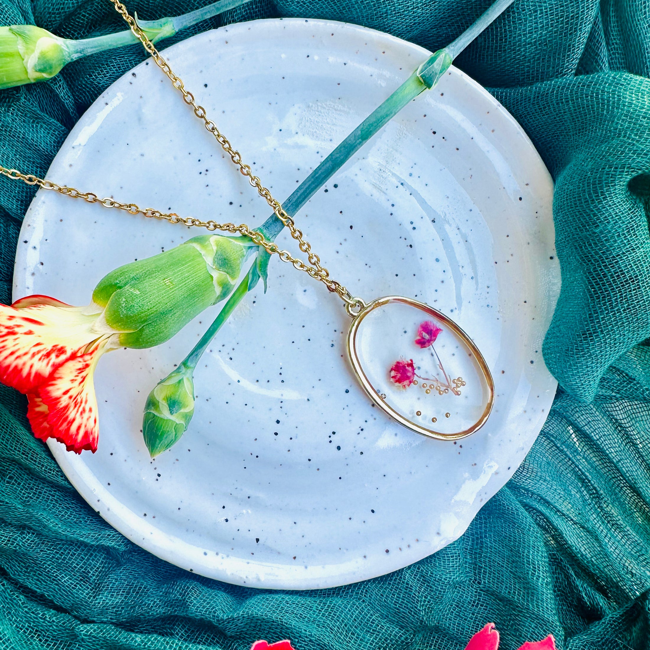 Large oval red flowers with gold