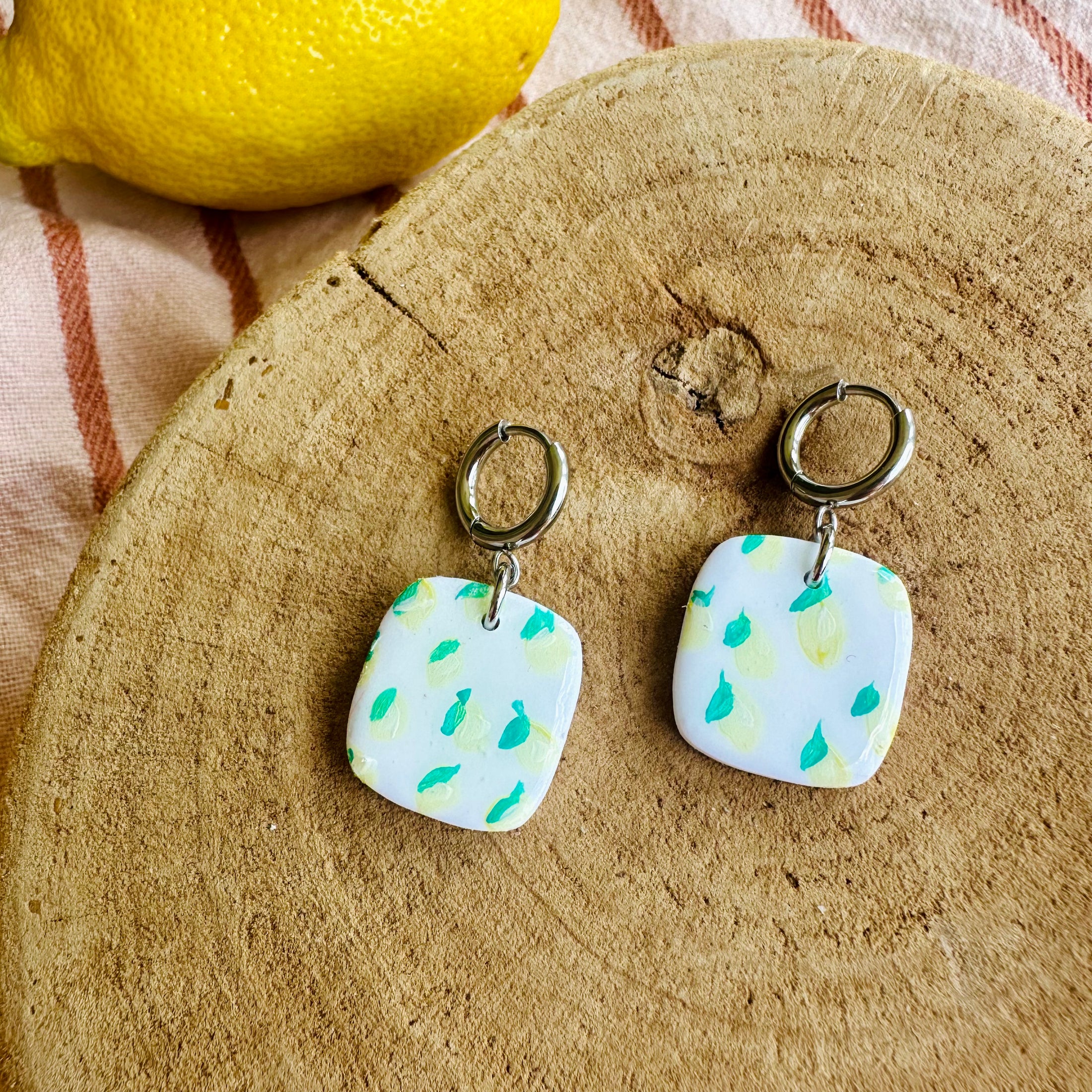 Mini lemons 2, silver (one rough edge, not noticeable)