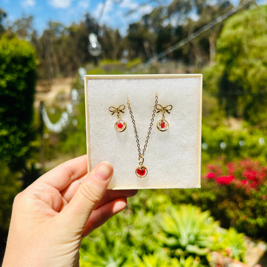 Red flower and gold gift box